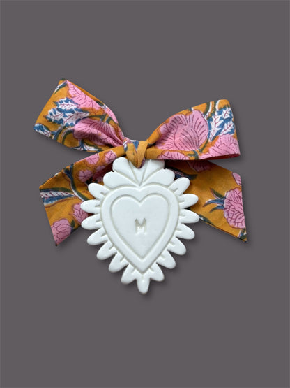 Coeur sacré en argile blanche