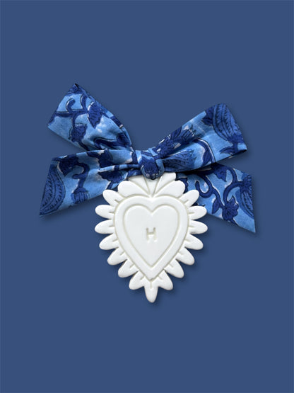 Coeur sacré en argile blanche